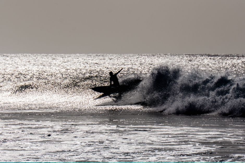 A lone surfer in the waves, Cape Verde